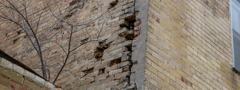 damaged brick wall