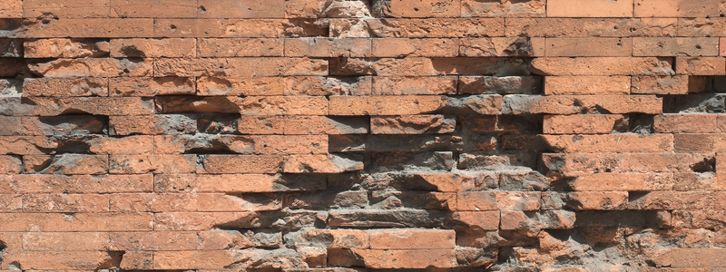 spalling brick wall